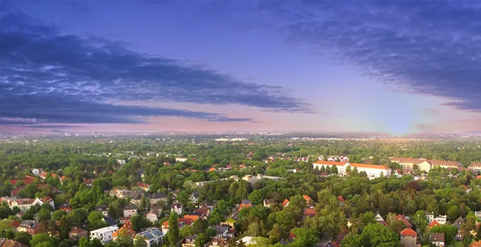 Aerial view of a residential neighborhood at sunset